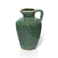 Tall antique green stoneware urn vase with reactive glaze finish, curved handle, and textured surface